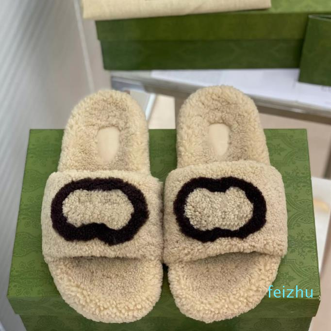 Ladies woolen Sheepskin Winter slipper fur one piece lamb wool warm and comfortable Fashion wear resistant rubber flat slippers 35-40
Ladies woolen Sheepskin Winter slipper fur one piece lamb wool warm and comfortable Fashion wear resistant rubber flat slippers 35-40