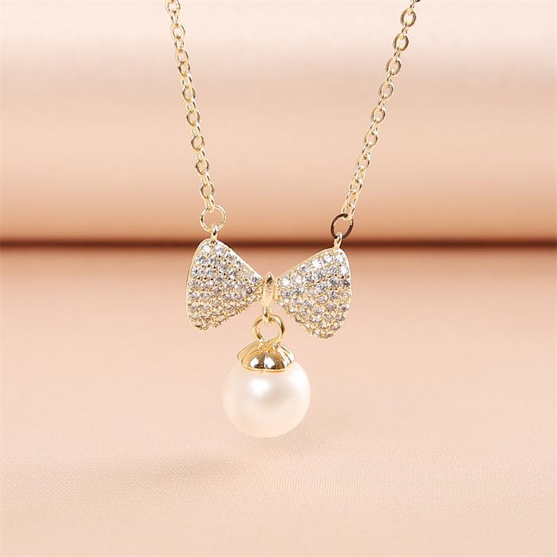 Pendant Necklaces WeSparking EMO Collar Pearl Cubic Zirconia Necklace For Women 14K Gold Plated Bow Design 2022 Trend Item, Silver
Pendant Necklaces WeSparking EMO Collar Pearl Cubic Zirconia Necklace For Women 14K Gold Plated Bow Design 2022 Trend Item, Silver