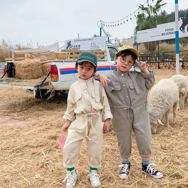 Korean style boys and girls fashion solid color oversized s spring autumn unisex kids long sleeve jumpsuits 210615, Beige 
Korean style boys and girls fashion solid color oversized s spring autumn unisex kids long sleeve jumpsuits 210615, Beige