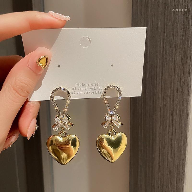 Stud Earring Female European And American Wind Metal Peach Heart Earrings Bow Sweet Pendant Temperament, Golden;silver
Stud Earring Female European And American Wind Metal Peach Heart Earrings Bow Sweet Pendant Temperament, Golden;silver
