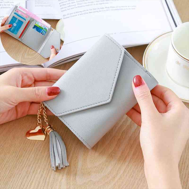 womens wallet tassel pendant short trend small fashion pu coin purse ladies card holders for female, Red;black
womens wallet tassel pendant short trend small fashion pu coin purse ladies card holders for female, Red;black