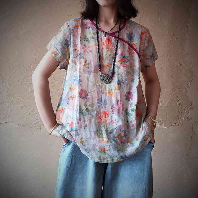 Johnature Women Blouses Vintage Summer Retro Tops Short Sleeve Linen Print Flower O-neck Loose Shirts Ramie Tops 210521
Johnature Women Blouses Vintage Summer Retro Tops Short Sleeve Linen Print Flower O-neck Loose Shirts Ramie Tops 210521