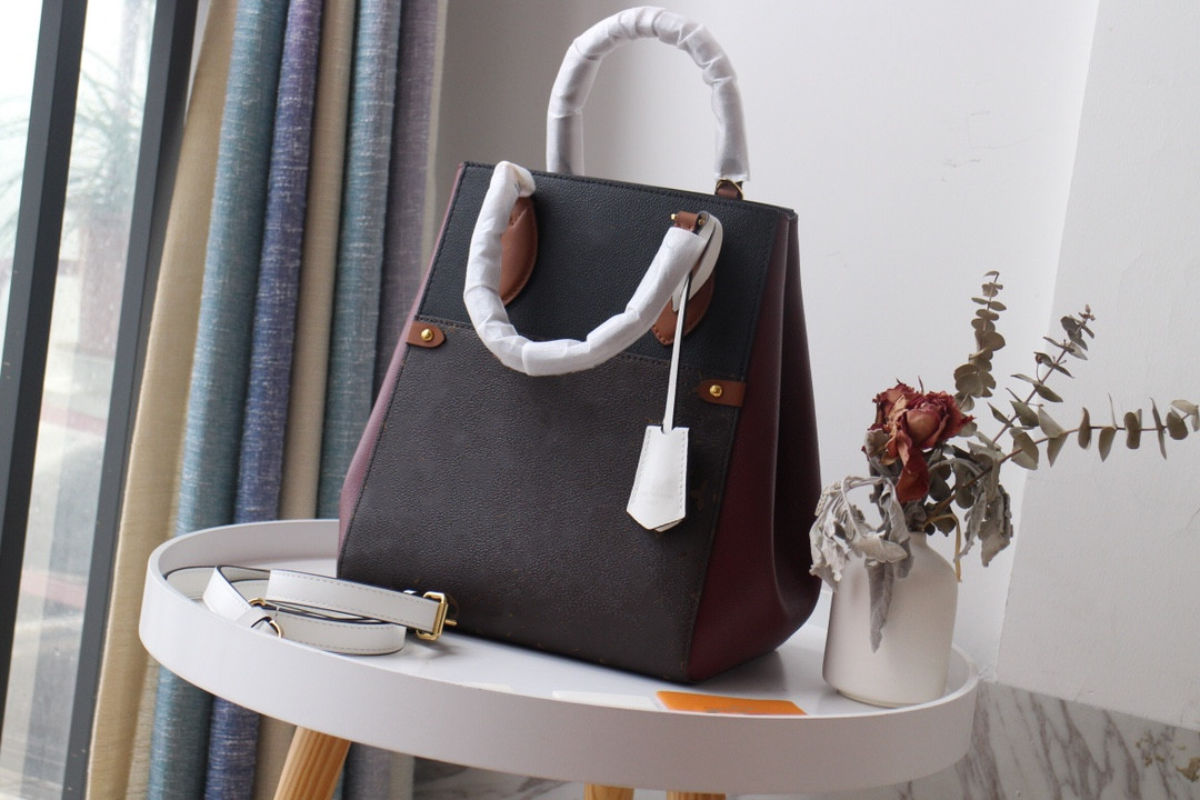Top quality bag brand luxury designer women's purse 2021 original handbagsimitation large capacity handbag wholesale
Top quality bag brand luxury designer women's purse 2021 original handbagsimitation large capacity handbag wholesale
