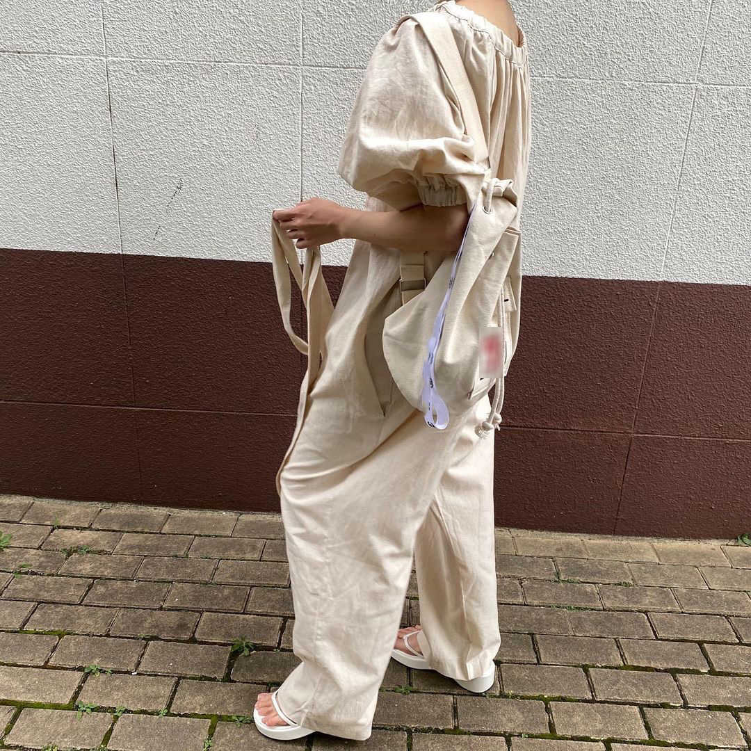 Korejpaa Women Jumpsuits Summer Korean Chic Temperament One-Word Collar Leaky Shoulders Folds Lace-Up Wide-Leg Jumpsuit 210526