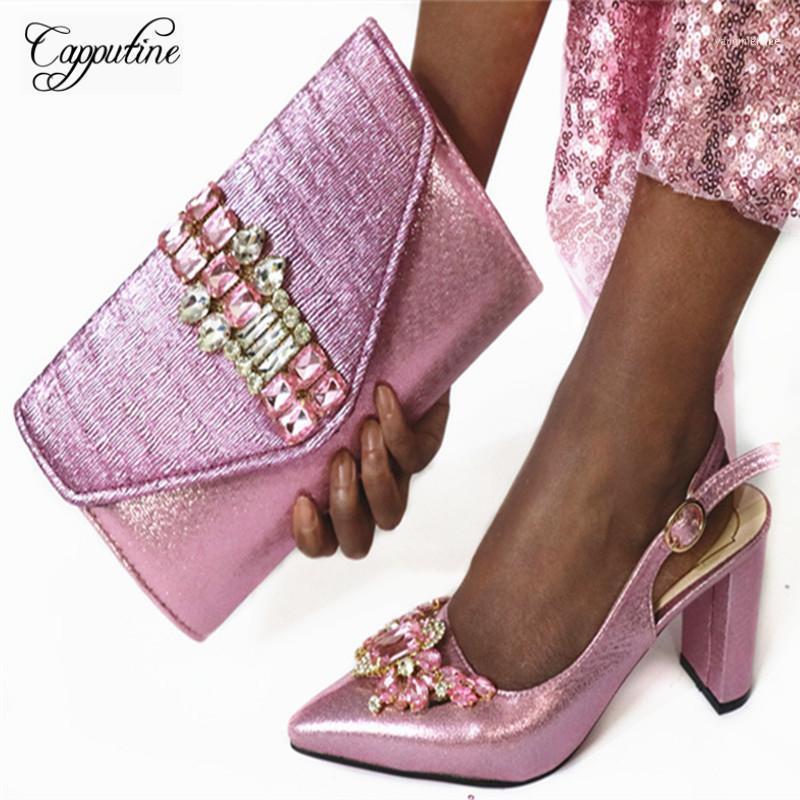 Capputine African Design Elegant Women Shoes And Bag Set For Party 2021 Arrival PU Wth Crystal High Heels Set1, Gold
Capputine African Design Elegant Women Shoes And Bag Set For Party 2021 Arrival PU Wth Crystal High Heels Set1, Gold