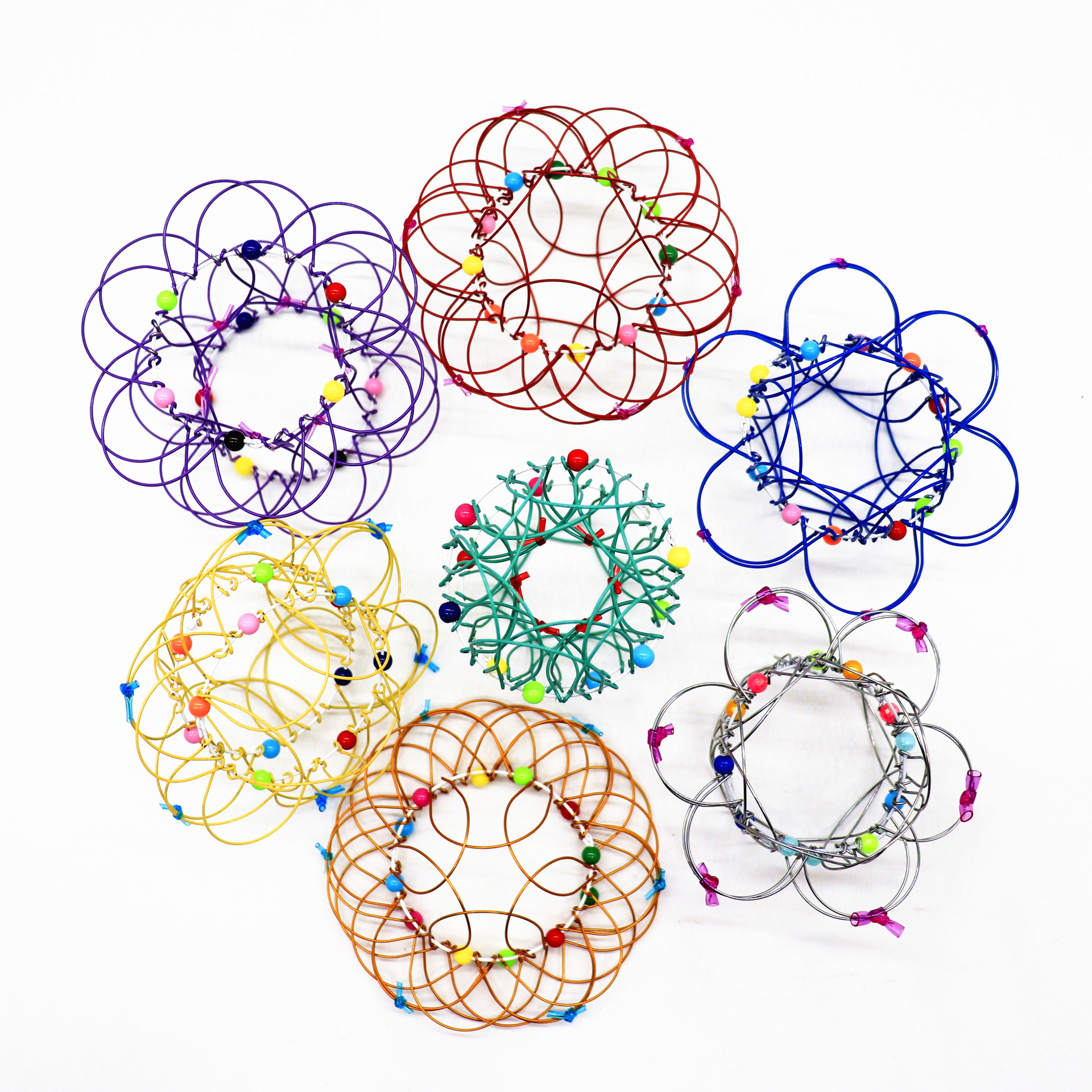 Multiple Changes Mandala Flower Basket Magic Flow Ring Fidget Toys Handmade Colored Iron Loops Wire Stress Reliever Finger Fun Game
Multiple Changes Mandala Flower Basket Magic Flow Ring Fidget Toys Handmade Colored Iron Loops Wire Stress Reliever Finger Fun Game