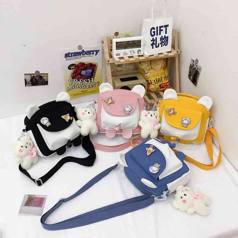Ins canvas women's Korean cute modeling Single Shoulder Messenger Bag change mobile phone student small square bag, Blue naked bag
Ins canvas women's Korean cute modeling Single Shoulder Messenger Bag change mobile phone student small square bag, Blue naked bag