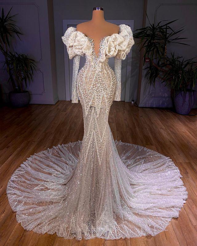 Luxury Mermaid 2021 Wedding Dresses Bridal Gowns Off The Shoulder Ruffles Long Sleeve Beaded Crystal Sweep Train Robe de mariée, Green
Luxury Mermaid 2021 Wedding Dresses Bridal Gowns Off The Shoulder Ruffles Long Sleeve Beaded Crystal Sweep Train Robe de mariée, Green