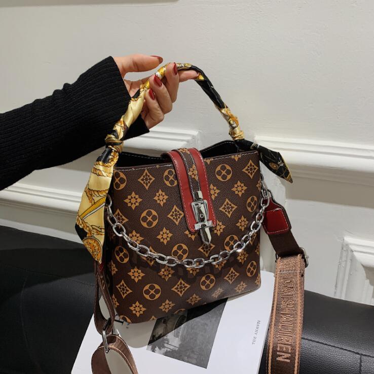 Factory Outlet women shoulder bags sweet and foreign printed leather bucket bag street fashion silver buckle handbag elegant atmosphere ribbon handbags