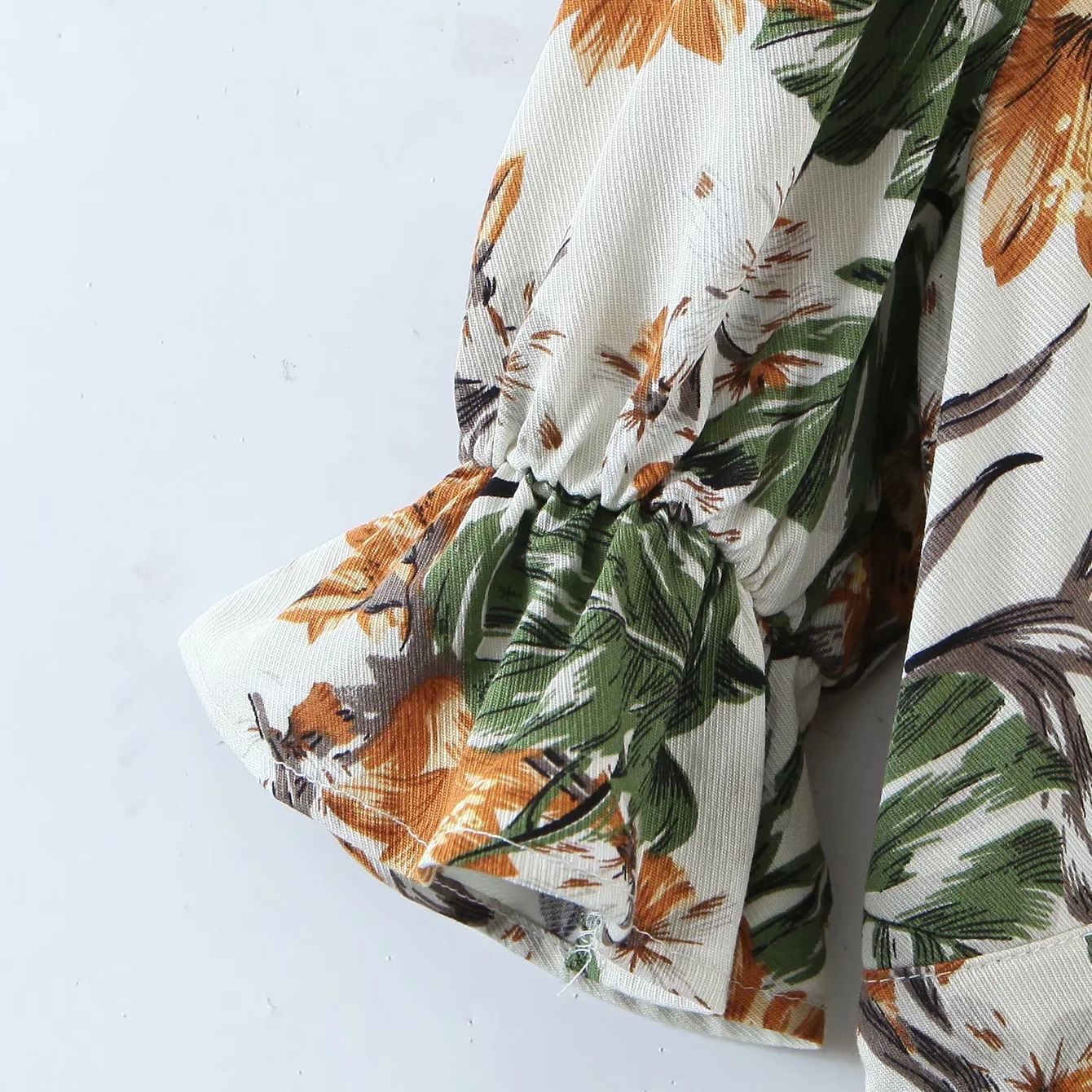 Foridol Deep V Neck Chiffon Romper Overall Puff Sleeve Wide Leg Summer Boho Playsuits Floral Print Green Short Jumpsuits 210415