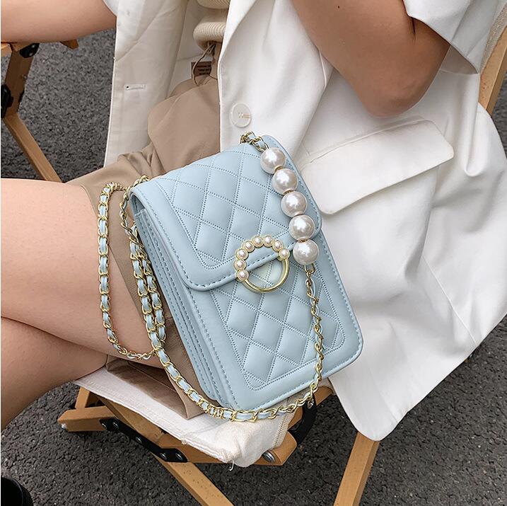 Factory wholesale women leather chain bag summer candy-colored coin purses street trend vertical plaid mobile phone handbag sweet lady Pearl Beads womens purse, Blue1(boutique box)
Factory wholesale women leather chain bag summer candy-colored coin purses street trend vertical plaid mobile phone handbag sweet lady Pearl Beads womens purse, Blue1(boutique box)