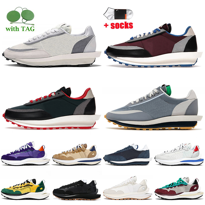 Top Quality LDV Waffle Running Shoes Women Mens Vaporwaffle Undercover Fragment Wolf Grey White Nylon Sail Black Gum Dark Iris Sesame Blue Void Trainers Sneakers, D30 black white 36-45
Top Quality LDV Waffle Running Shoes Women Mens Vaporwaffle Undercover Fragment Wolf Grey White Nylon Sail Black Gum Dark Iris Sesame Blue Void Trainers Sneakers, D30 black white 36-45