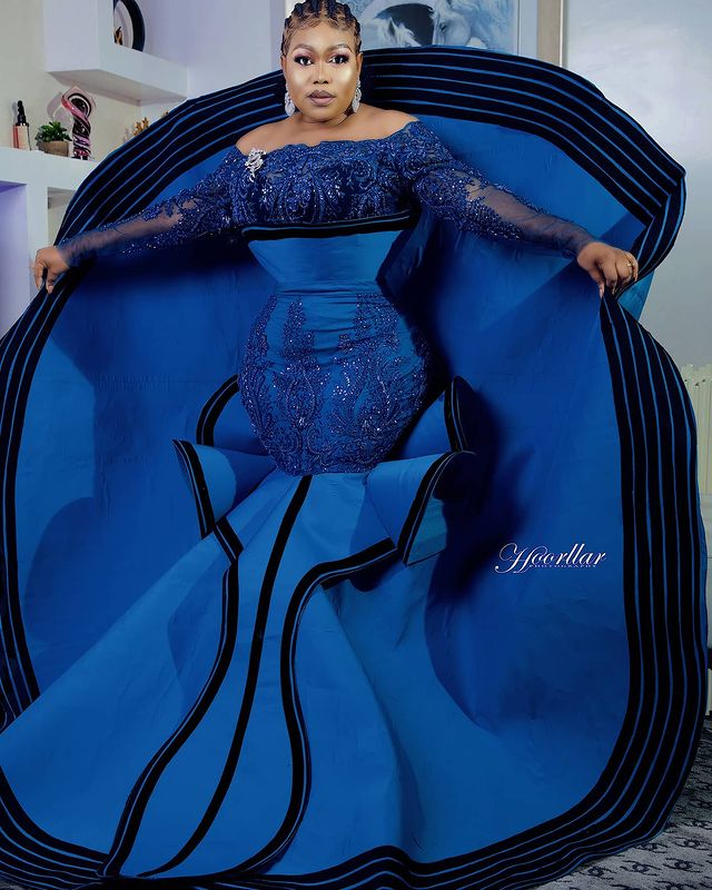 chic arabianinspired fulllength cocktail dress opulent blue beadwork intricate lace detailing