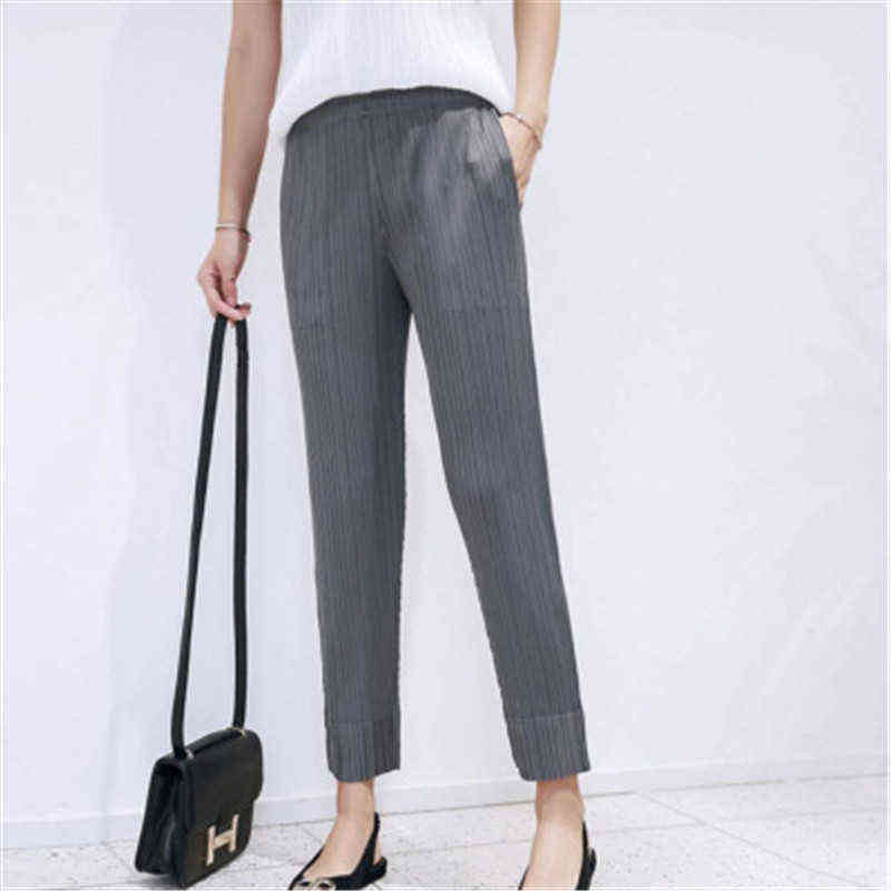 Miyake folds fashion cropped trousers, solid color, large size, slim fit, urban casual pants, split women's pants 211115
