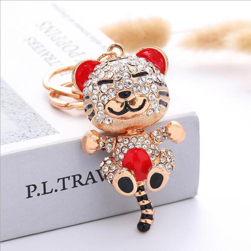 Keychains JINGLANG Trend Creative Metal Cute Tiger Rhinestone Car Keychain Accessoreis Bag Ornament Key Pendant Small Gift
Keychains JINGLANG Trend Creative Metal Cute Tiger Rhinestone Car Keychain Accessoreis Bag Ornament Key Pendant Small Gift