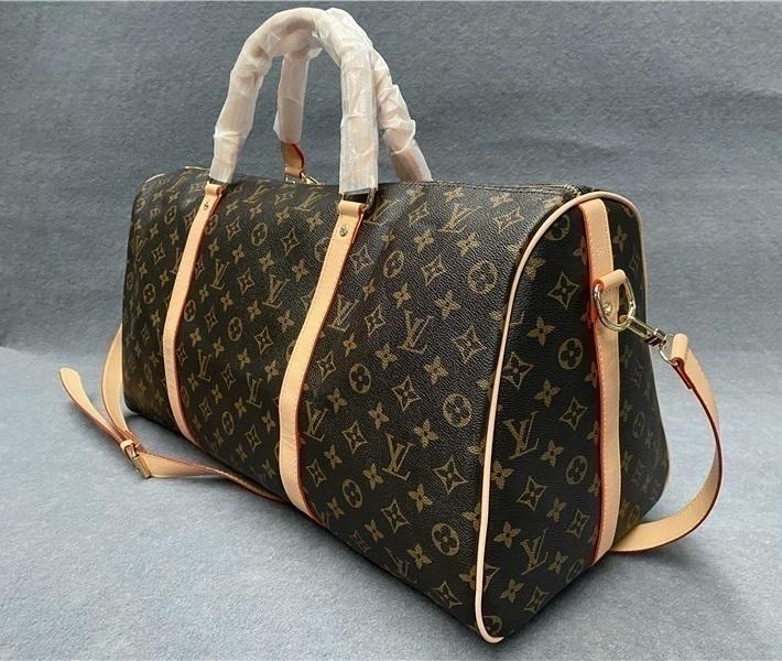 Designers Handbag 54cm Man DUFFLE Travel shoulder Bag Mens Duffel Backpack Outdoor Sport Luggage bag Male Messenger Bags With lock LVLouisVitton Vutton
Designers Handbag 54cm Man DUFFLE Travel shoulder Bag Mens Duffel Backpack Outdoor Sport Luggage bag Male Messenger Bags With lock LVLouisVitton Vutton