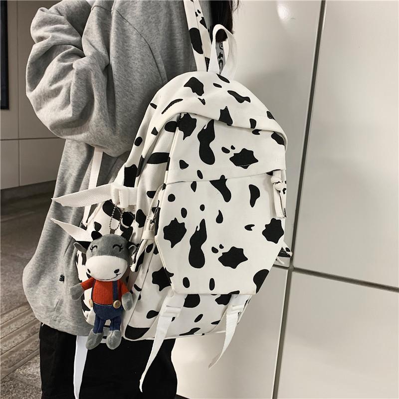 Backpack Milk Cow Pattern School Bags For Girls Boy Female Ins Cute Canvas Shoulder Bag Harajuku Man Csaual Women's Backpacks
Backpack Milk Cow Pattern School Bags For Girls Boy Female Ins Cute Canvas Shoulder Bag Harajuku Man Csaual Women's Backpacks