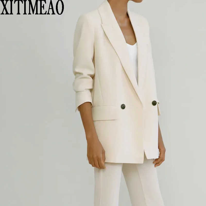 ZA Women Fashion With Buttons Blazers Coat Vintage Long Sleeve Beige Suit Female Outerwear Chic Tops XITIMEAO 210604
ZA Women Fashion With Buttons Blazers Coat Vintage Long Sleeve Beige Suit Female Outerwear Chic Tops XITIMEAO 210604