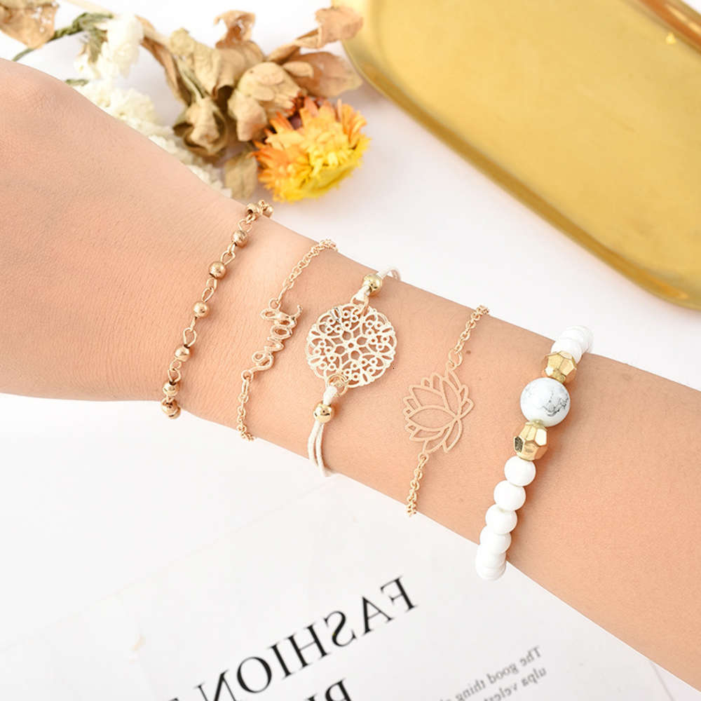 Hand catenary Jewelry five Bracelet hollowed out English alphabet lotus white bead handpiece, Black
Hand catenary Jewelry five Bracelet hollowed out English alphabet lotus white bead handpiece, Black