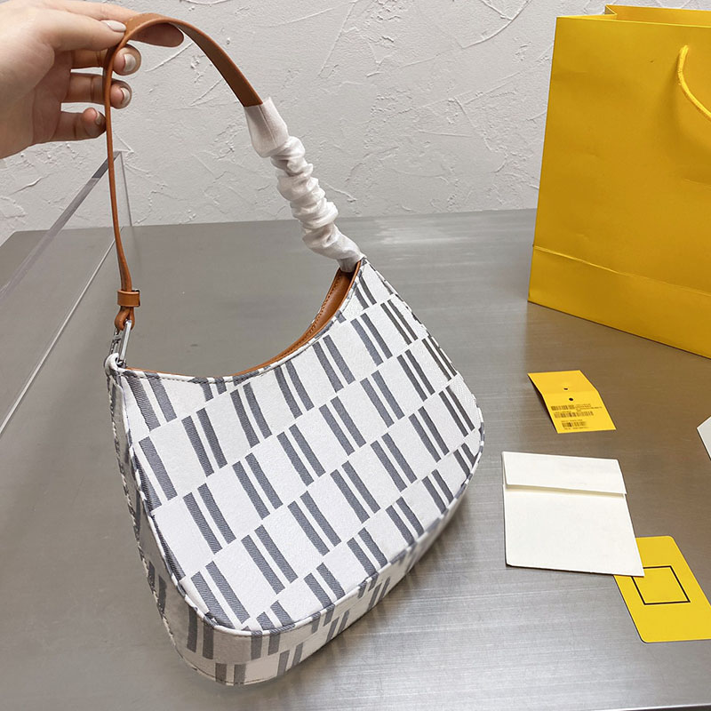 Street style women's shoulder bag classic letter print designer bag Cloth+leather material flat hand purse Half a month, Blue
Street style women's shoulder bag classic letter print designer bag Cloth+leather material flat hand purse Half a month, Blue