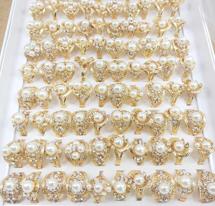 Hot sales flower KC Golden zircon Pearl ring mix style Multi Size Lady/girl Fashion ring 50pcs/lot
Hot sales flower KC Golden zircon Pearl ring mix style Multi Size Lady/girl Fashion ring 50pcs/lot