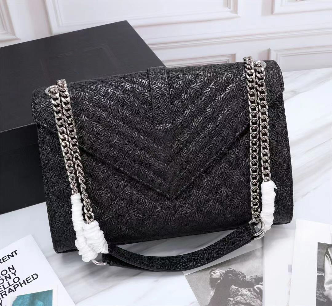2021 Luxury designer handbag ENVELOPE genuine leather women bag high quality with chain shoulder Classic Double Flap Bags 487206 487198 24cm,31cm, Black gold 24cm
2021 Luxury designer handbag ENVELOPE genuine leather women bag high quality with chain shoulder Classic Double Flap Bags 487206 487198 24cm,31cm, Black gold 24cm