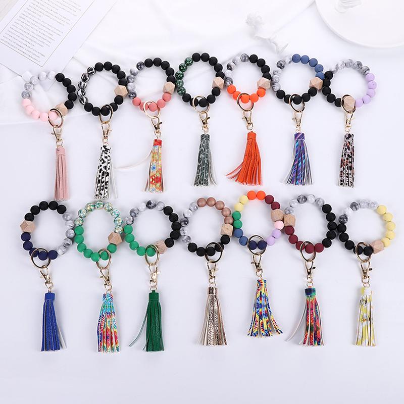 Charm Bracelets Acrylic Wooden Bead Keychain Vintage Leather PU Tassel Anti-lost Key Ring Bracelet
Charm Bracelets Acrylic Wooden Bead Keychain Vintage Leather PU Tassel Anti-lost Key Ring Bracelet