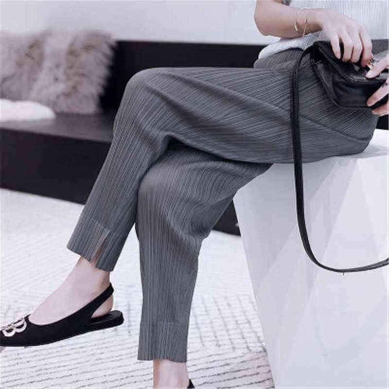 Miyake folds fashion cropped trousers, solid color, large size, slim fit, urban casual pants, split women's pants 211115
