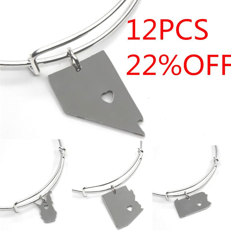 State Map Bracelet Silver Tone Arizona Texas Hampshire Florida Alaska Utah North Carolina Nevada Connectut Bangle
State Map Bracelet Silver Tone Arizona Texas Hampshire Florida Alaska Utah North Carolina Nevada Connectut Bangle