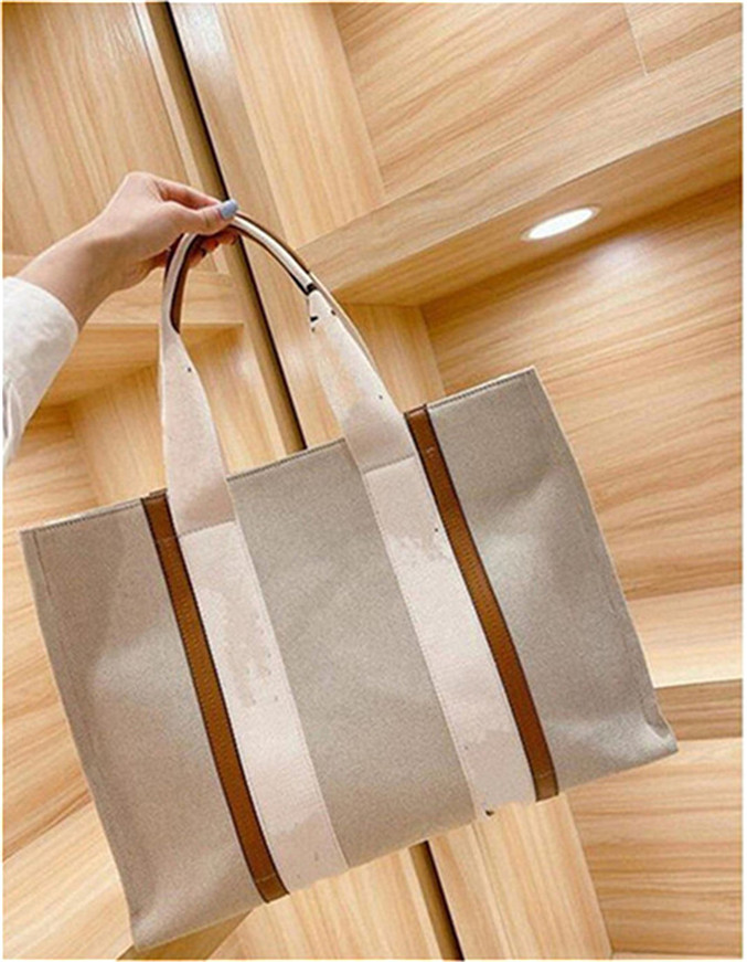 A-EW 2021 Womens Shopper Fashion Totes Bags Shoulder Bag Women Canvas Woody Tote Handbags Purses Small Medium Large High Quality Handbag 02
A-EW 2021 Womens Shopper Fashion Totes Bags Shoulder Bag Women Canvas Woody Tote Handbags Purses Small Medium Large High Quality Handbag 02