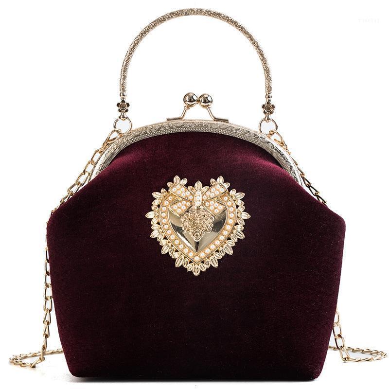 Evening Bags 2021 Femme Retro Velvet Pearl Handbag Vintage Velour Heart Design Bag Wedding Party Bride Clutch Badge Purse
Evening Bags 2021 Femme Retro Velvet Pearl Handbag Vintage Velour Heart Design Bag Wedding Party Bride Clutch Badge Purse