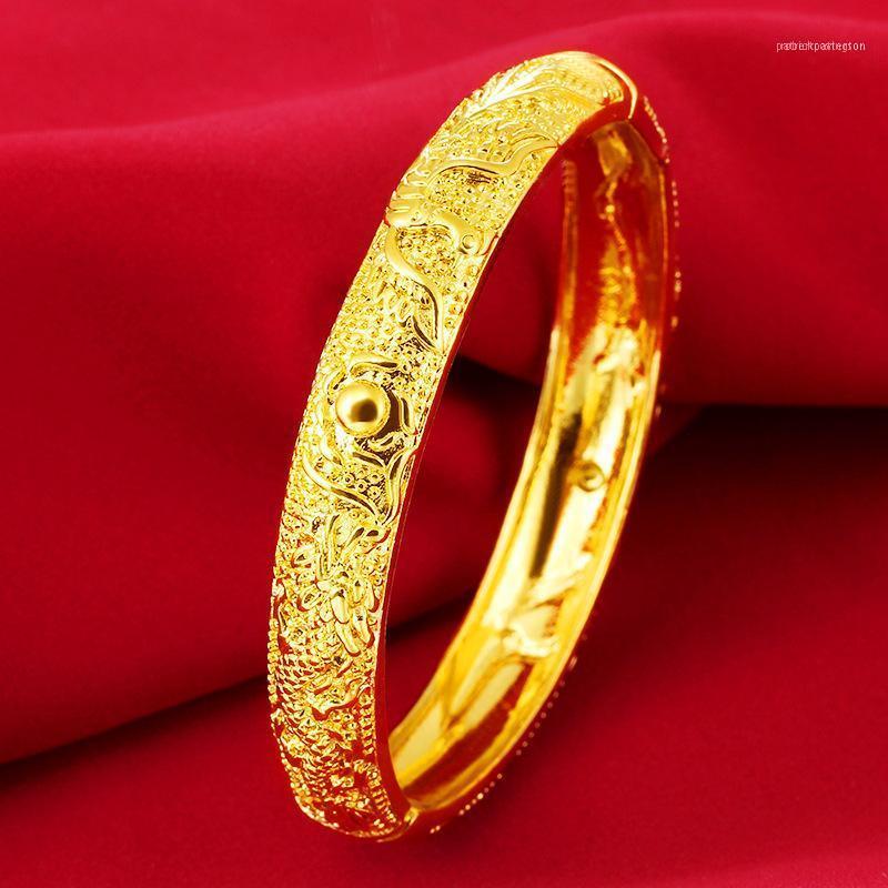 Bangle Trending Women Jewelry Dubai Gold Filled Dragon & Phoenix Pattern Solid Bracelet Diameter 60mm1
Bangle Trending Women Jewelry Dubai Gold Filled Dragon & Phoenix Pattern Solid Bracelet Diameter 60mm1