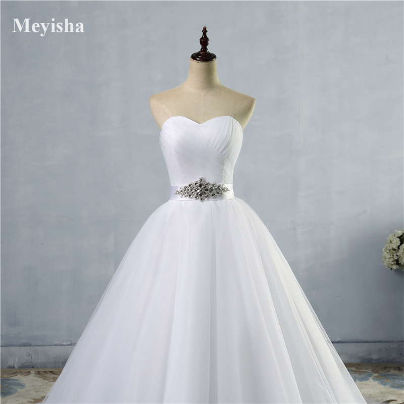 ZJ9056 2021 Sexy Wedding Dress High Quality Lace A-Line Elegant White Ivory Vintage Beaded Sash Backless Bride Dresses