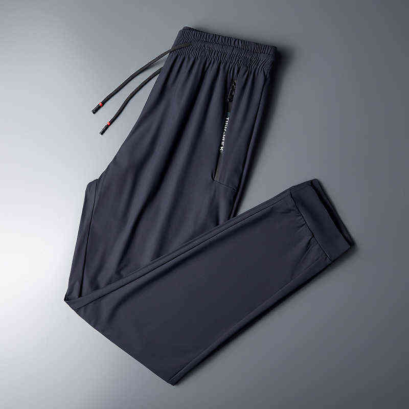 Summer Ice Silk Sweatpants Men Quick Dry Breathable Loose Fitness Belted Straight Pants Slim Stretch Cool Casual Men Pants 7XL 211112