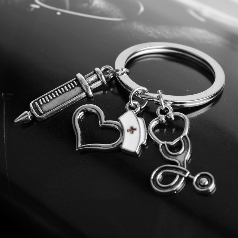 10Pieces/Lot New/high quality 1 piece nurse medical syringe stethoscope image keychain glass cabochon and glass dome key ring pendant gift.
10Pieces/Lot New/high quality 1 piece nurse medical syringe stethoscope image keychain glass cabochon and glass dome key ring pendant gift.