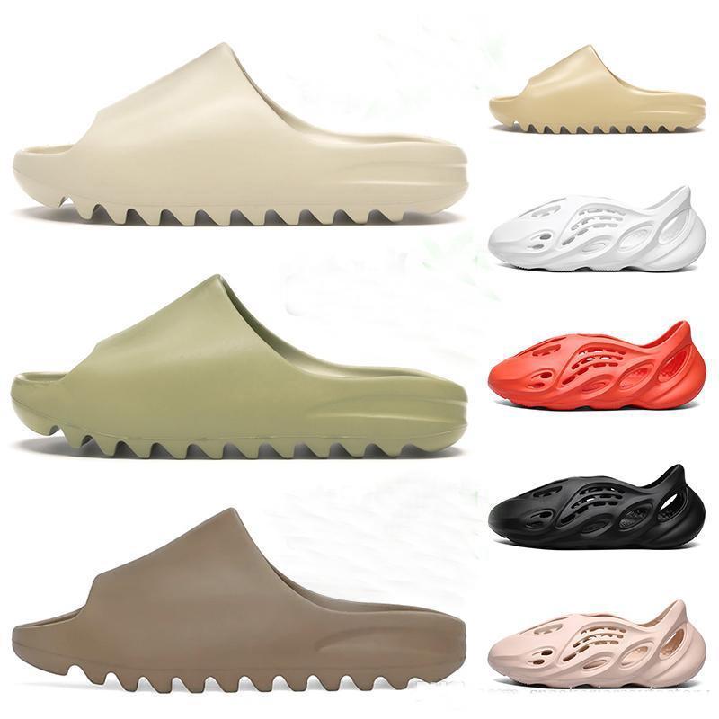 Kanye Foam Rubber West Clog Sandals Triple Black White Slides Fashion Slippers Womens Mens Beach Sandals Flip Flops 36 -45 bb
Kanye Foam Rubber West Clog Sandals Triple Black White Slides Fashion Slippers Womens Mens Beach Sandals Flip Flops 36 -45 bb