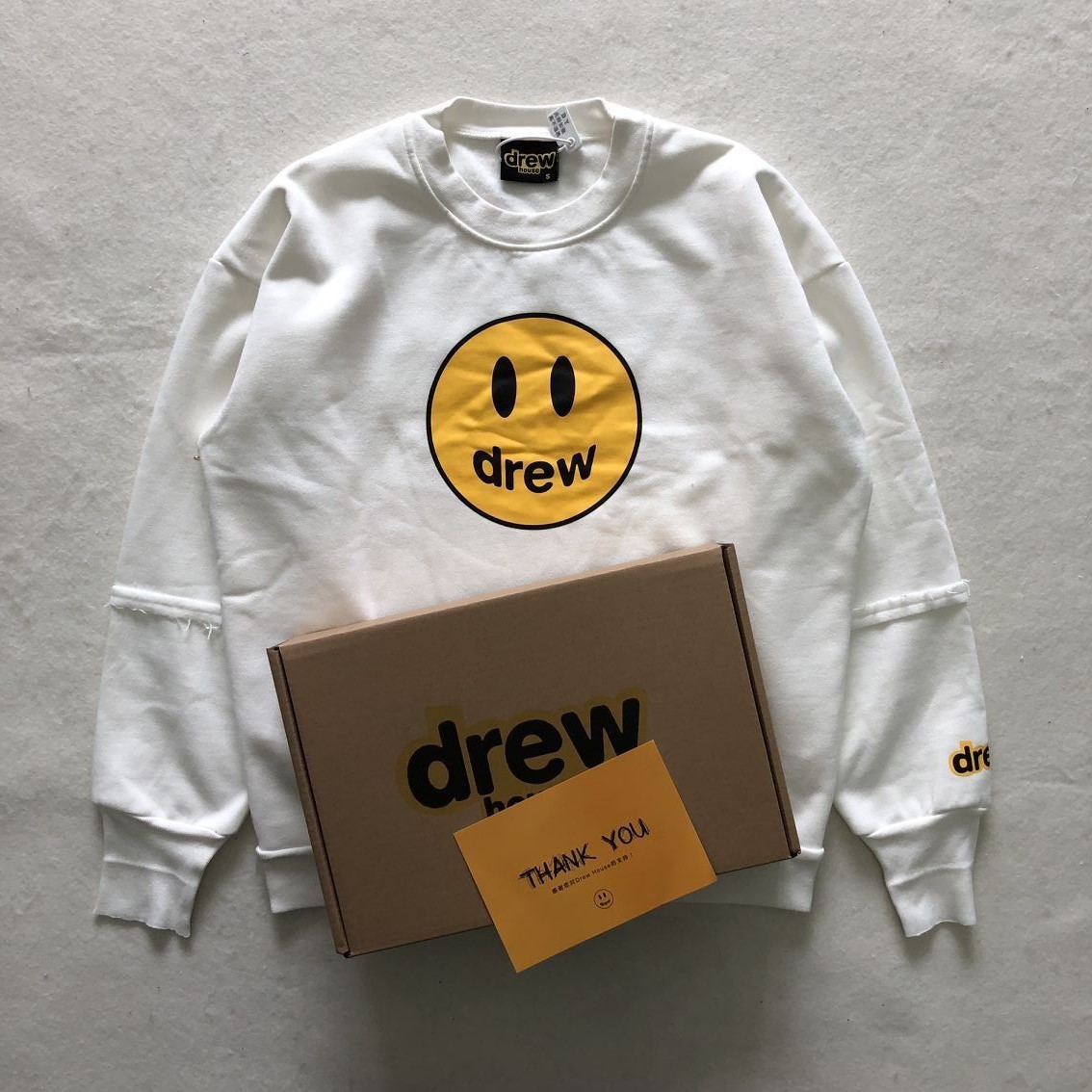 The right version of drew house smiley face basic solid color cartoon print high street loose round neck sweater C6PV, Black 
The right version of drew house smiley face basic solid color cartoon print high street loose round neck sweater C6PV, Black