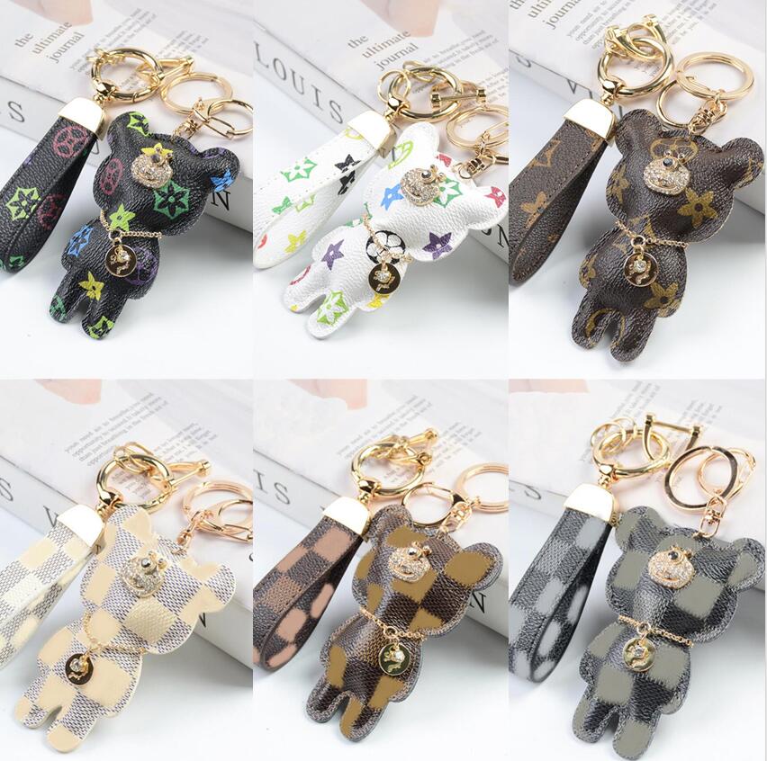 Fashion Designer Key Ring Jewelry Accessories High Quality Genuine Leather Cartoon Bear Flower Pattern Car Keychains Mens Womens Bag Backpack KeyChain Charm Gifts
Fashion Designer Key Ring Jewelry Accessories High Quality Genuine Leather Cartoon Bear Flower Pattern Car Keychains Mens Womens Bag Backpack KeyChain Charm Gifts