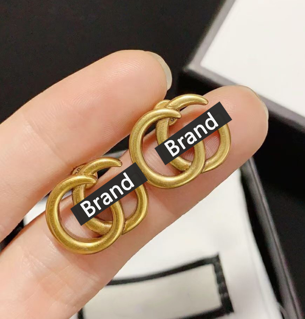 Women Classic Stud Earring Fashion Gold Eardrop Vintage Hollow Letter Earrings Personality Party Jewelry Luxury Studs Earrings
Women Classic Stud Earring Fashion Gold Eardrop Vintage Hollow Letter Earrings Personality Party Jewelry Luxury Studs Earrings