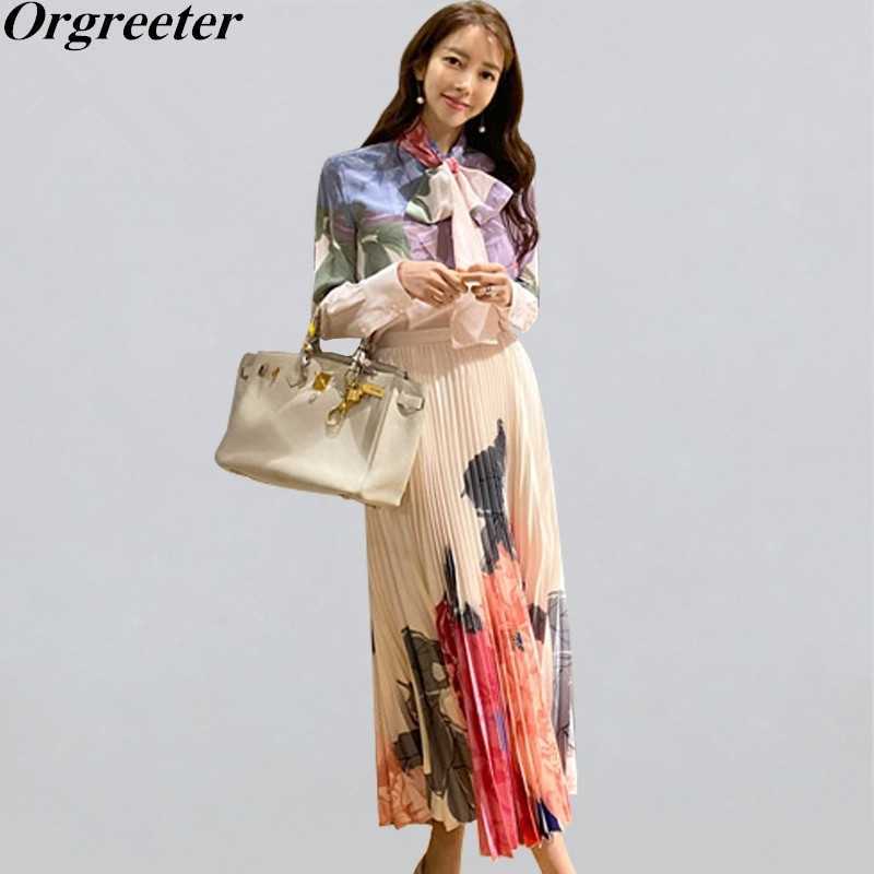 Spring Fall Korean high-end bow tie lace Printed Shirt and High waist Pleated Long Skirt Two-piece set Women OL Casual Suit 210525, Piture color
Spring Fall Korean high-end bow tie lace Printed Shirt and High waist Pleated Long Skirt Two-piece set Women OL Casual Suit 210525, Piture color