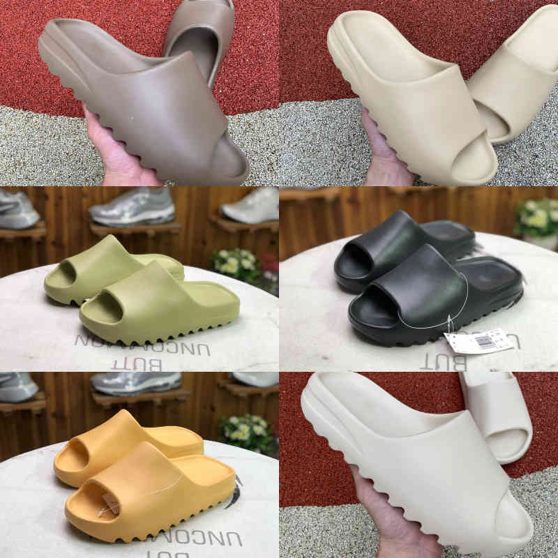 2021 New Kanyas Wests Slipper Men Women Slide Bone Earth Brown Desert Sand Slide Resin Fashion Shoes Sandals Foam Runner Trainers Size 36-45 F07
2021 New Kanyas Wests Slipper Men Women Slide Bone Earth Brown Desert Sand Slide Resin Fashion Shoes Sandals Foam Runner Trainers Size 36-45 F07