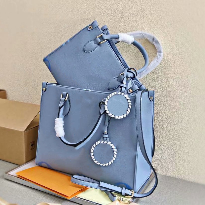 2021 Genuine Leather Handbag Designers Onthego Handbags Tote Shopping Messenger Bag Women Shoulder Bags Totes Cosmetic Pockets
2021 Genuine Leather Handbag Designers Onthego Handbags Tote Shopping Messenger Bag Women Shoulder Bags Totes Cosmetic Pockets