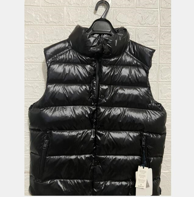 Thick down vest black sleeveless down jacket fashion design front chest logo men and women winter wear white duck down vest
Thick down vest black sleeveless down jacket fashion design front chest logo men and women winter wear white duck down vest