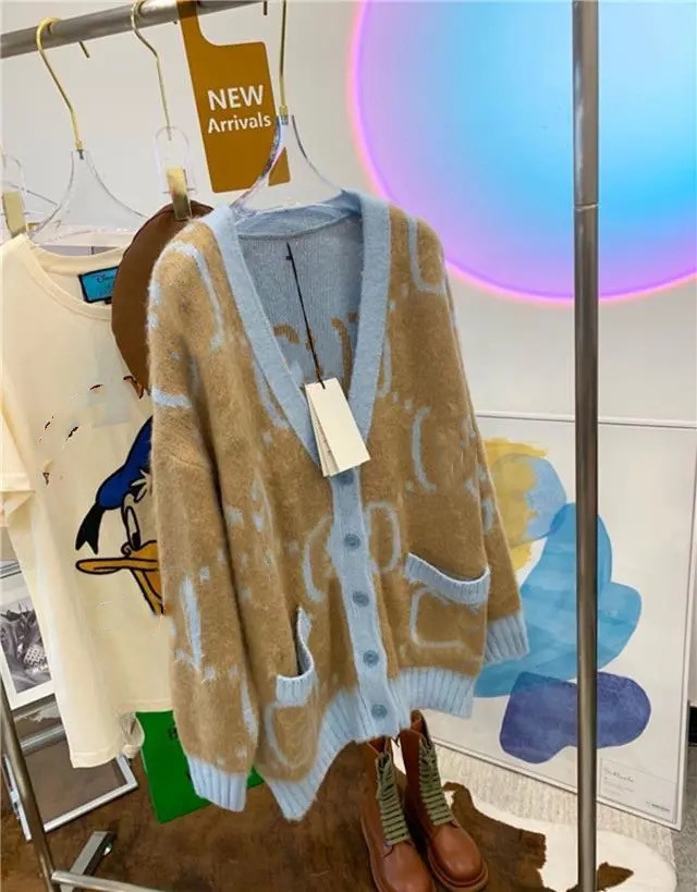 2021 new loose retro lazy straight blue cardigan women's furry mohair sweater coat early winter
2021 new loose retro lazy straight blue cardigan women's furry mohair sweater coat early winter