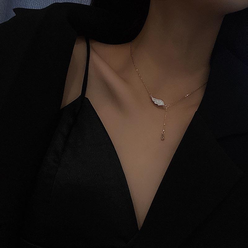 Pendant Necklaces Exquisite Angel Wing Shell Necklace With Super Fairy Temperament Zircon Tassel Clavicle Chain Female
Pendant Necklaces Exquisite Angel Wing Shell Necklace With Super Fairy Temperament Zircon Tassel Clavicle Chain Female