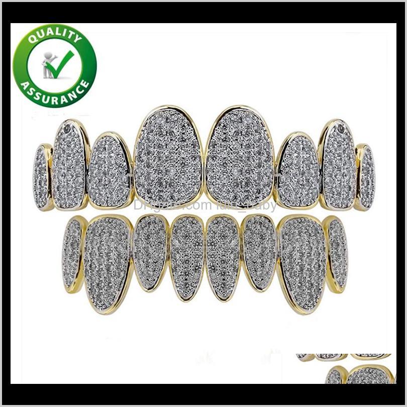 Teeth Grillz Hip Hop Jewelry Set Men Women Iced Out Diamond Grill Luxury Designer Hiohop Bling Accessories Rapper Fashion Charms Mouma Rdrth
Teeth Grillz Hip Hop Jewelry Set Men Women Iced Out Diamond Grill Luxury Designer Hiohop Bling Accessories Rapper Fashion Charms Mouma Rdrth