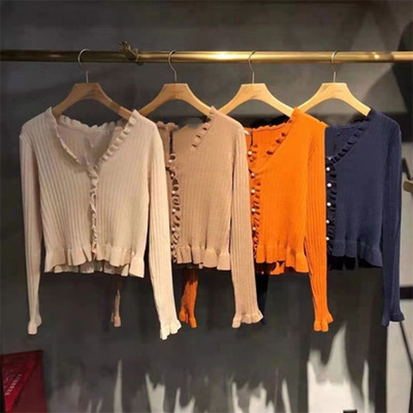 V-neck Ruffles Flare Sleeve Women Cardgian Chic Exquisite Pearl Buttons Design Slim Tops Spring Vintage Knitted Sweaters 210519, Light beige 
V-neck Ruffles Flare Sleeve Women Cardgian Chic Exquisite Pearl Buttons Design Slim Tops Spring Vintage Knitted Sweaters 210519, Light beige