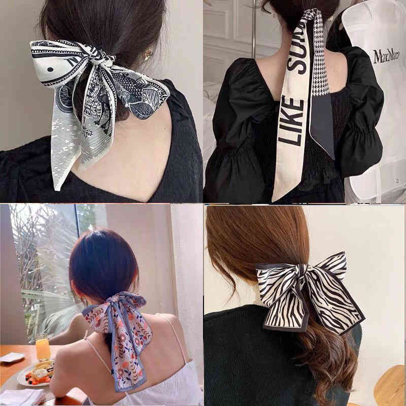 Korean version tied Hair Scarf Hair Band bow French accsori super fairy streamer thousand bird lattice head rope, Black;purple
Korean version tied Hair Scarf Hair Band bow French accsori super fairy streamer thousand bird lattice head rope, Black;purple