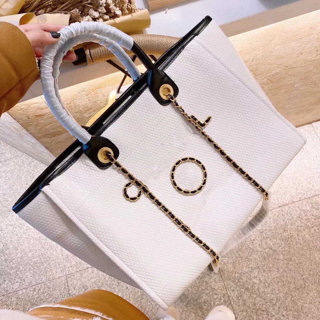 Big Brand Design Small Fragrant Wind Inclined Span Bag Large Capacity Tote Beach Bag Woven Canvas Chain Bag
Big Brand Design Small Fragrant Wind Inclined Span Bag Large Capacity Tote Beach Bag Woven Canvas Chain Bag