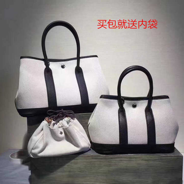 2021 matching garden fashion women's Bag Canvas lychee grain cow leather contrast color portable shoulder bag, 25 elephant grey
2021 matching garden fashion women's Bag Canvas lychee grain cow leather contrast color portable shoulder bag, 25 elephant grey
